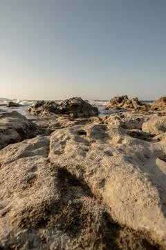 Rocky beach. View from a low angle Stock Photos