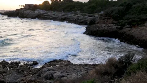 Rocky beach with waves Stock Footage 153998486
