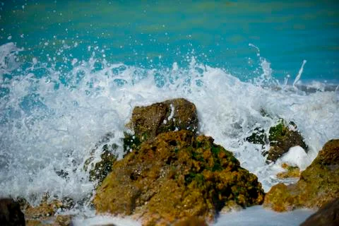 Rocky beach with waves Stock Photos