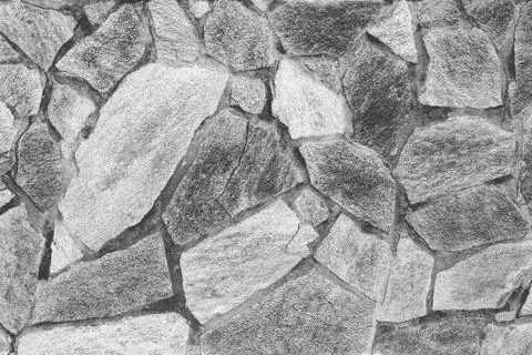 A rocky brick wall pattern Stock Photos