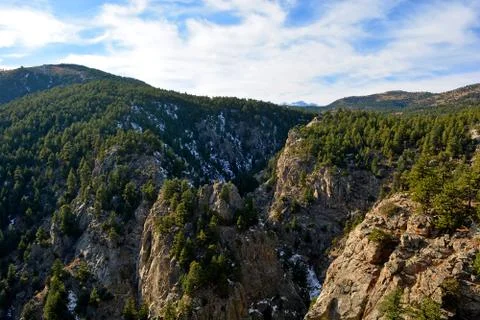 Rocky Canyon in the Mountains with Pine Trees Stock Photos