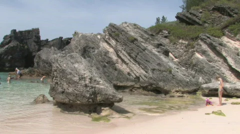 Rocky Caribbean Cliffs in Bermuda with Blue Water and White Sandy Beaches Stock Footage 463645