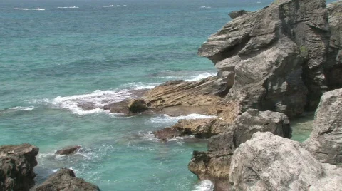 Rocky Caribbean Cliffs in Bermuda with Blue Water and White Sandy Beaches Stock Footage 464057