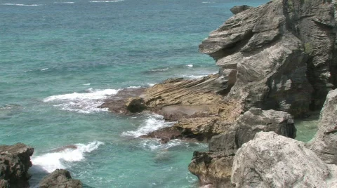 Rocky Caribbean Cliffs in Bermuda with Blue Water and White Sandy Beaches Stock Footage 464112