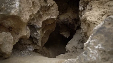 Rocky cave in the mountains Stock Footage 76990379