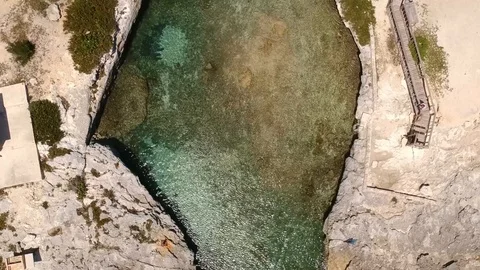 Rocky Circular Water Cave at Eight Mile Rock, Grand Bahama Bahamas Aerial Stock Footage 89391337