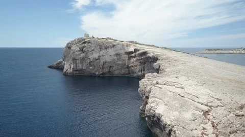Rocky cliff in the beautiful ocean Stock Footage 85821953