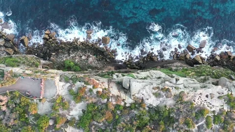 Rocky cliff with the sea Stock Footage 147015648