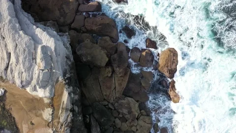 Rocky cliff with the sea Stock Footage 147017654