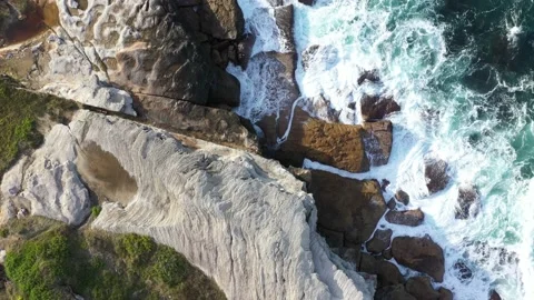 Rocky cliff with the sea Stock Footage 147017973