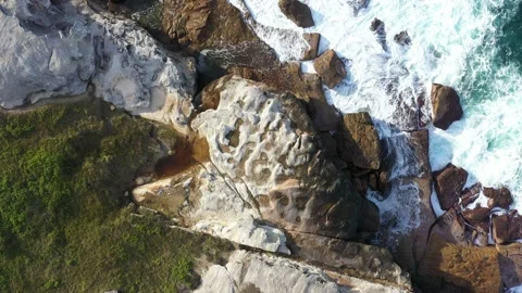 Rocky cliff with the sea Stock Footage 147018095