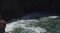 Rocky cliffs and foamy sea zoom out at Portugal southern tourism spot Sagres 4k 4k or 4k+ Resolution