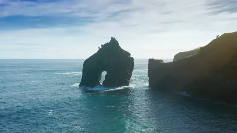 Rocky cliffs in Atlantic ocean, Casa do Gato Tomas, Flores Island, Azores Видео 153474351
