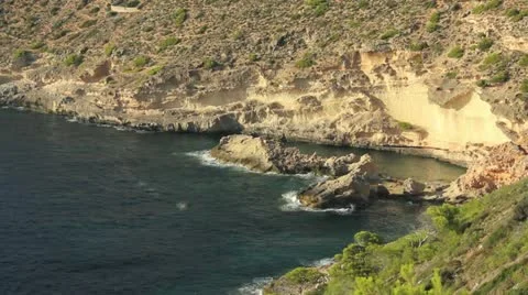 Rocky cliffs on the coast of Mallorca Stock Footage 12538125