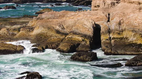 Rocky cliffs by the ocean, view from bluffs, beautiful dramatic seascape Stock Footage 154060735