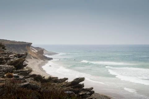 Rocky cliffs on seashore 스톡 사진