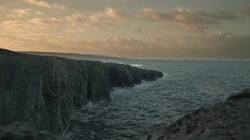 Rocky Cliffs with waves crashing in, Ireland Stock Footage