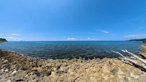 Rocky coast with blue ocean view. Siargao, Philippines. Stock Footage 321601693