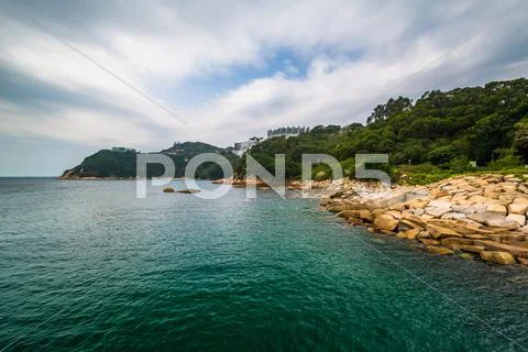 Rocky coast at Stanley, on Hong Kong Island, Hong Kong. Stock Photos