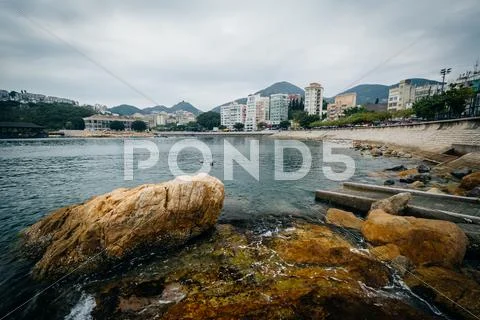 Rocky coast at Stanley, on Hong Kong Island, Hong Kong. Stock Photos