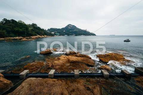 Rocky coast at Stanley, on Hong Kong Island, Hong Kong. Stock Photos