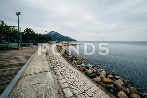 Rocky coast at Stanley, on Hong Kong Island, Hong Kong. Stock Photos