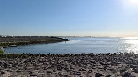 Rocky coastal landscape with an intertidal zone and open marine waters. Stock Footage 340229774