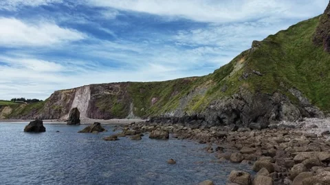 Rocky Coastline and Cliffs at Ballydwan Beach Waterford Ireland Stock Footage 337397839