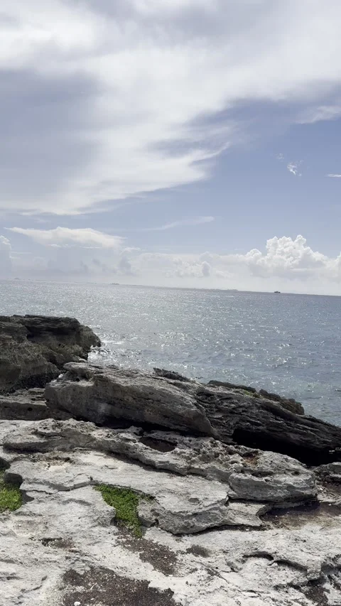 Rocky Coastline and Ocean with Dramatic Clouds in Cancun, Mexico Stock Footage 318315371