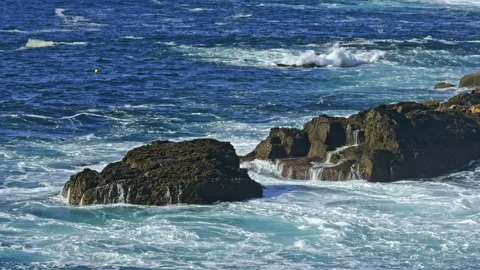 Rocky coastline with dinamic waves Stock Footage 277105286