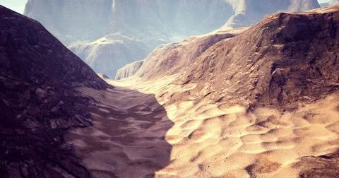 Rocky desert landscape with dramatic shadows and mountains in background Stock Illustration