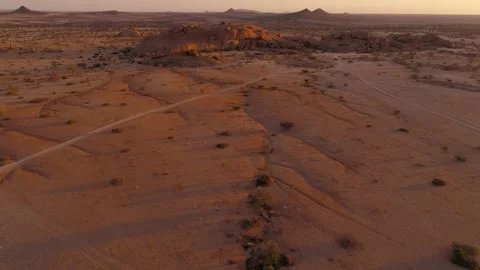 Rocky desert of Namibia, illuminated by red light. Aerial footage. Stock Footage 138643029