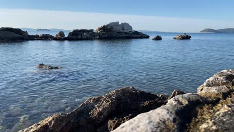 Rocky edges of Bačvice Beach in Split, Croatia Stock Footage 328093763