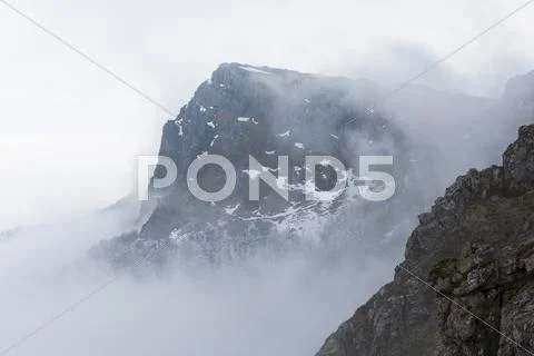 Rocky Foggy Mountain Peak