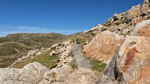 Rocky Hiking Path Through Alpine Terrain on the Main Range, Mount Kosciuszk.. Stock Footage 312062451
