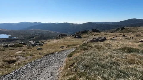 Rocky Hiking Path Through Alpine Terrain on the Main Range, Mount Kosciuszk.. Stock Footage 312062478