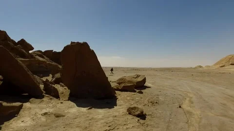 A rocky hill dotted with stone textures contrasts against, stock footage. Stock Footage 304866065