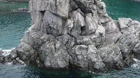 Rocky island in the ocean Video stock 310345246