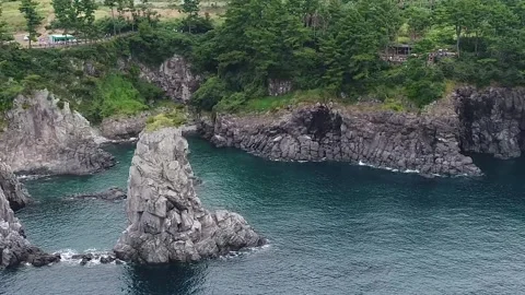 Rocky island in the ocean Video stock 310345262