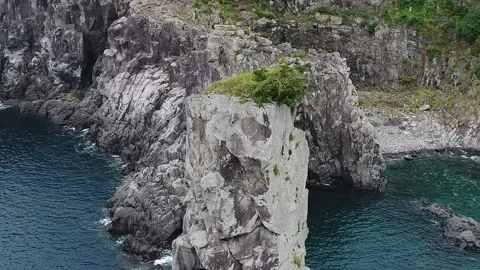 Rocky island in the ocean Video stock 310345273