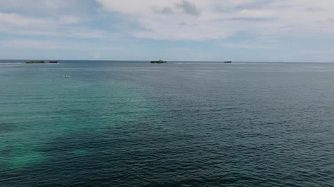 Rocky islets with green vegetation in ocean. Siargao, Philippines. Stock Footage 321378643