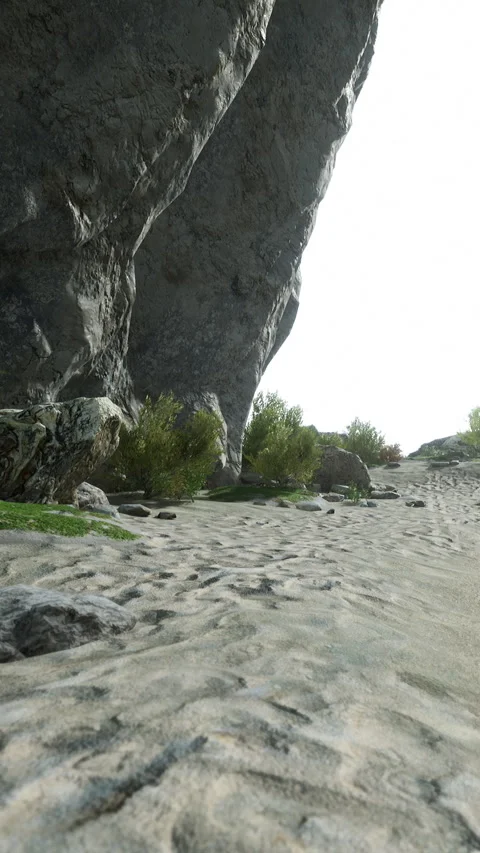 Rocky landscape with path and greenery near cliff face in bright light Stock Footage 341977295