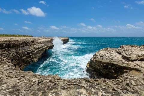 Rocky limestone coastline at devil's bridge antigua Stock Photos