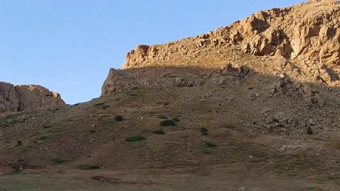 Rocky mount peak in sunset light Stock Footage 266396660