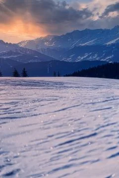 Rocky mountain with a beautiful cloudy dramatic sunset Stock Photos