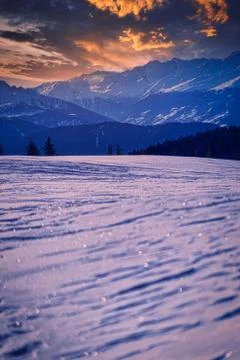 Rocky mountain with a beautiful cloudy dramatic sunset Stock Photos