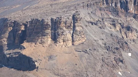 Rocky mountain cliff panning shot Antarctica, 4K Stock Footage 332374341