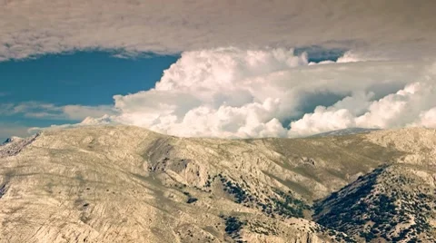 Rocky mountain with clouds Stock Footage 8537049