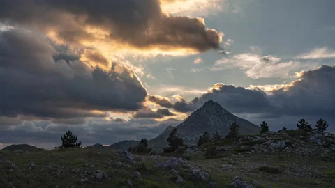 Rocky mountain with a dramatic cloudy sky Stock Footage 133501490