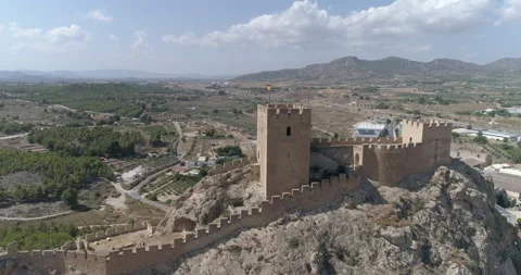 Rocky mountain drone side flight with medieval castle Stock Footage 209999143